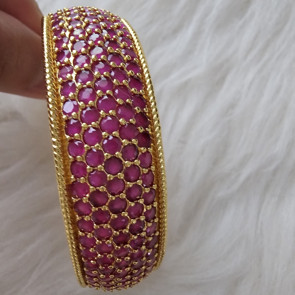 Pink Gemstones gold color bracelet